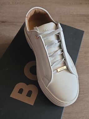 BOSS White Leather Low-Top Sneaker with Gold Lace Tag